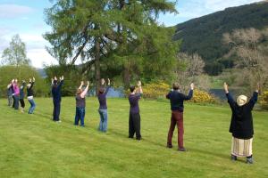 Retreatants doing Qi Gong