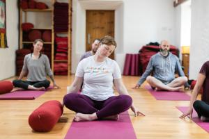 Retreatants doing yoga